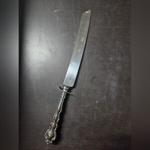 Elegant Silver Serrated Cake Knife